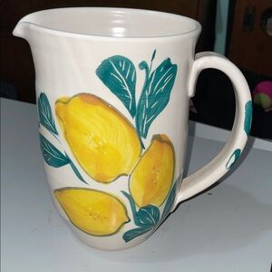 Pottery pitcher with lemon design - approximately   7 1/2” tall